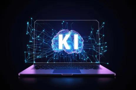 KI für GS1 Sync Symbolbild eines Laptops mit "KI" und einem Gehirn am Bildschirm
