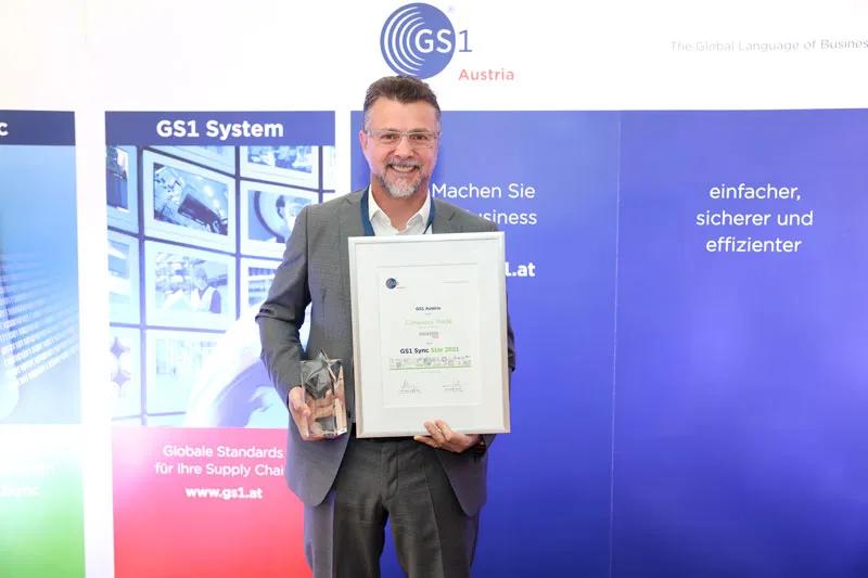 Reinhard Mülleder mit dem GS1 Sync Star Award 2021